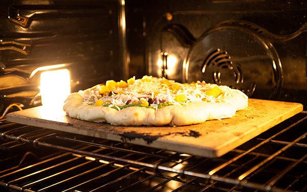 Image of pizza in oven