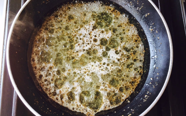 In a non-aluminum 8-inch skillet, add vinegar, sugar, oil, mustards and celery seed. Heat on medium heat until boiling, stirring occasionally, until sugar is dissolved.
