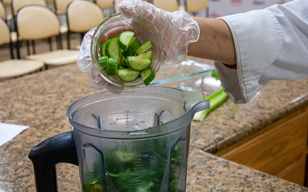 Place all the ingredients, except the water, in a high-speed blender and blend on high until the mixture is the consistency of juice, adding water if necessary. 