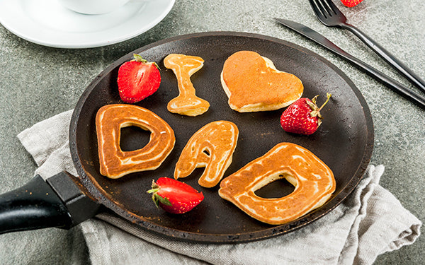 Image of pancakes and strawberries in frying pan