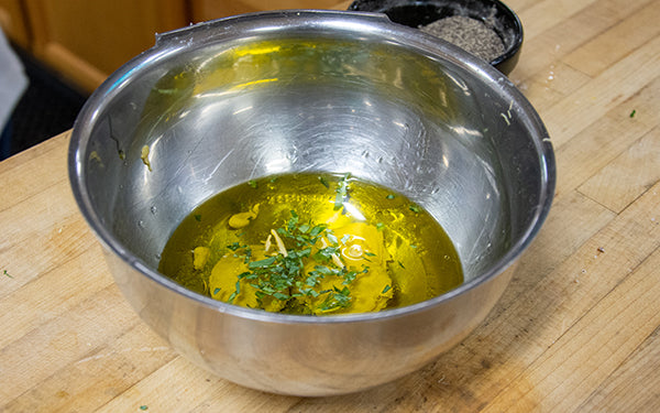 To make the dressing, mix the extra virgin olive oil, Dijon mustard, vinegar, tarragon, sugar, salt and pepper together and whisk to emulsify. Adjust seasonings and set aside.