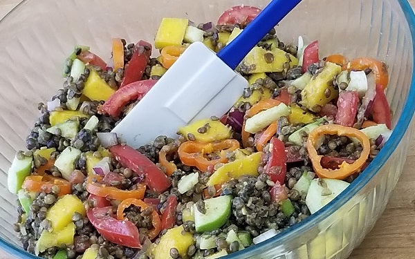 Image of Mixing Salad in Bowl