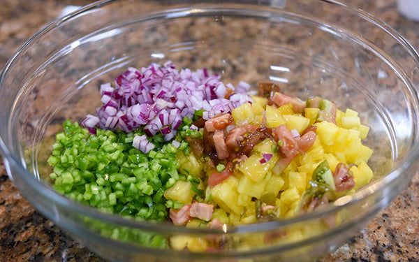 To make the salsa, combine all the ingredients in a bowl. Adjust seasoning to taste and set aside.