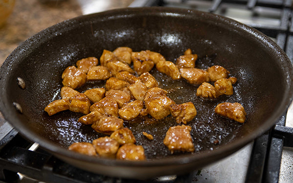 Marinate the chicken cubes in ½ cup of the barbecue sauce, cover and refrigerate for at least one hour. 