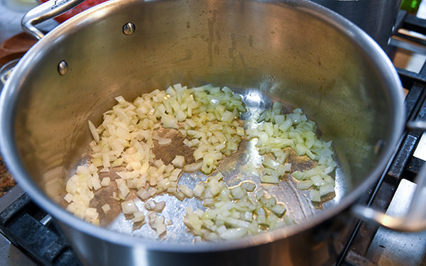 Image of onions and garlic sautéing