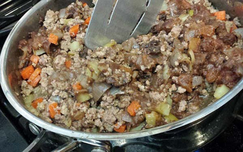 Image of Combine this mixture with the ground meat mixture, blend thoroughly and set aside until ready to stuff the tenderloin