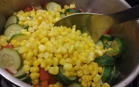 Image of When zucchini is almost done, add corn, reduce to low heat