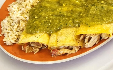 Image of enchilada with green sauce