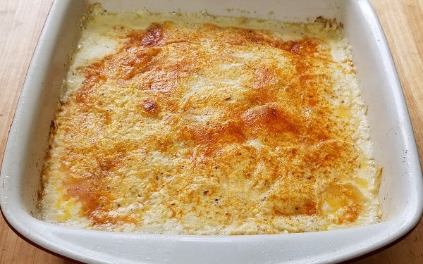 Top with the last half-cup of cheese and sprinkle with a light dusting of paprika. 