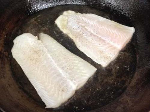 Image of searing fish fillets