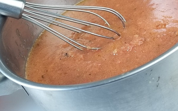 For the enchilada sauce: Place the butter in a saucepan over medium heat, then add in all the ingredients, except the puree, and sauté for 3 minutes.
