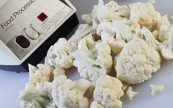 Pulse chopped cauliflower florets in a food processor until the consistency of rice; do in small batches to insure uniformity. Set aside for the final sauté.