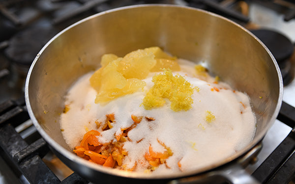 Carefully remove all of zest/peel/skin from the lemon; chop zest and add to saucepan. 