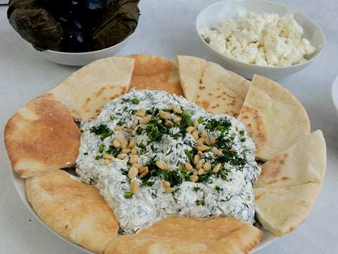 Image of Turkish-Style Yogurt Spinach Dip with Pita Bread, Feta Cheese and Stuffed Peppers