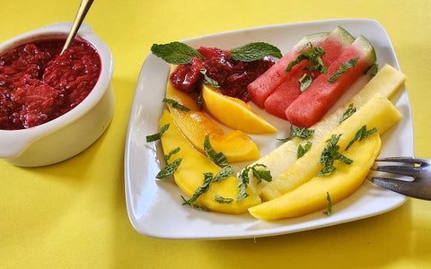 Image of Tropical Fruit Spears with Berry-Orange Sauce