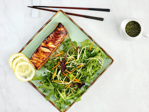 Image of Thai-Style Salad of Baby Greens, Cucumbers, Carrots and Mint with Cilantro Dressing and Grilled Salmon