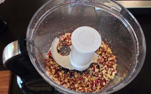 Image of chopped walnuts in food processor