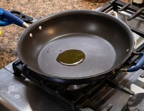 Image of olive oil in pan