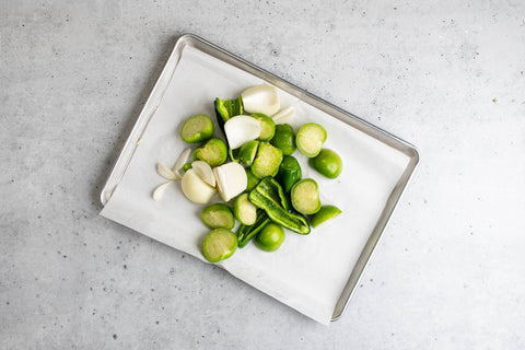 Image of diced veggies on baking sheet