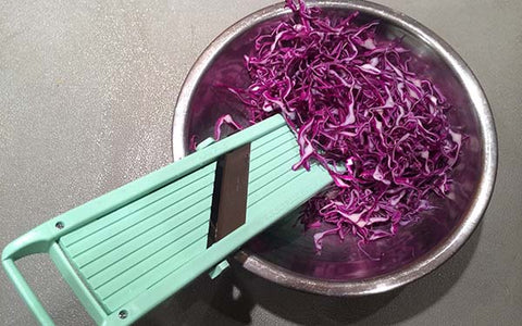 Image of sliced red cabbage in a large bowl