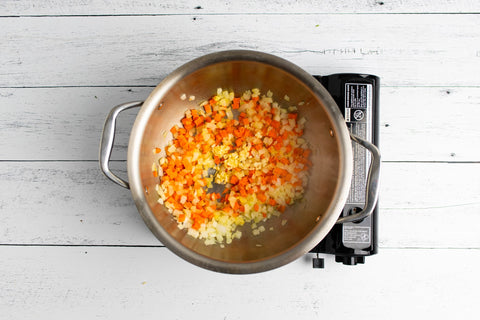 Image of veggies in soup pot