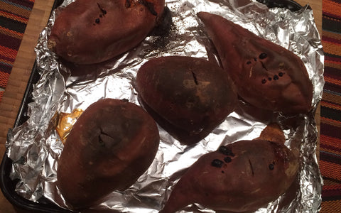 Image of Preheat oven to 400 degrees. Pierce sweet potatoes with a fork 4-5 times. Line a baking pan with foil, and place sweet potatoes in baking pan. Cook for about 1 hour and 20 minutes, or, until sweet potatoes are soft in the center when pierced with a knife. Remove sweet potatoes from oven and allow to cool