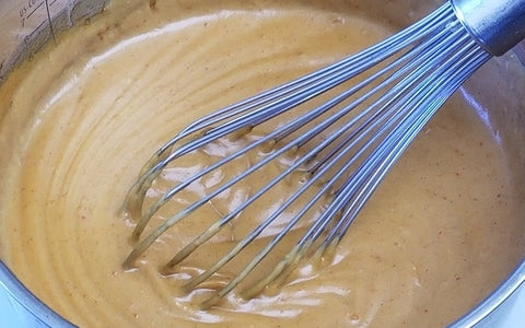 Image of whisking sauce