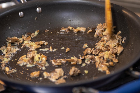 Image of sauteing ginger and mushrooms