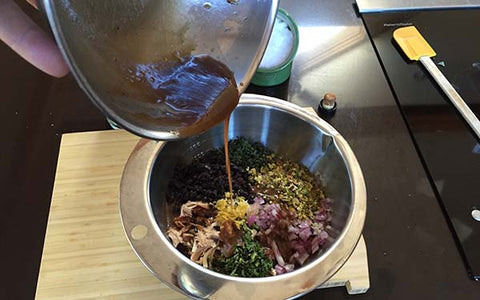 Image of Add dressing and remaining ingredients to the quinoa and mix well