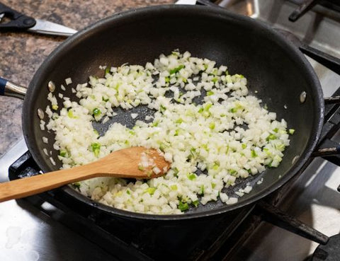 Image of onion and jalapeno peppers sauté