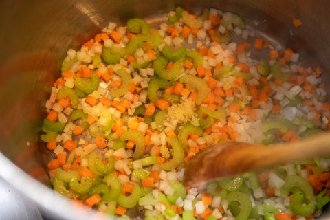 Image of stirring soup vegetables in pot