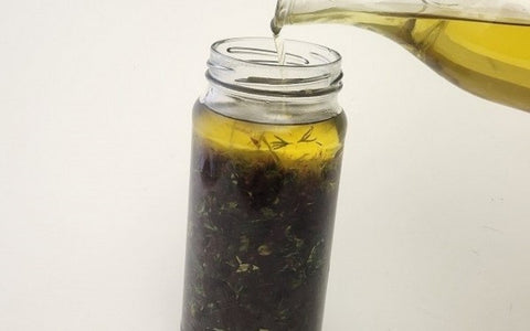 Image of transferring sauce to mason jar