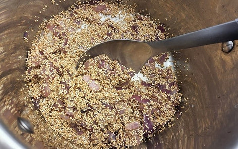 Image of mixing quinoa with the rest of the ingredients
