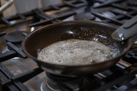 Image of melted butter in sauté pan