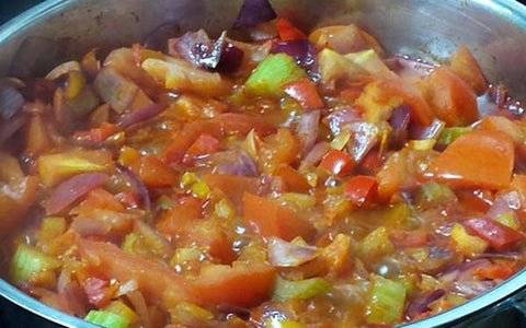 Image of Stir in the tomatoes and chicken stock, bring to the boil and remove from flame