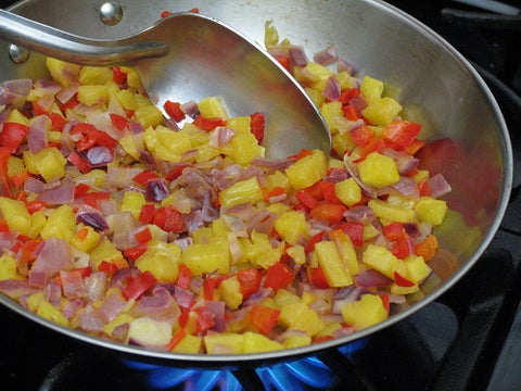 Image of grilling pineapple, red onion and bell pepper