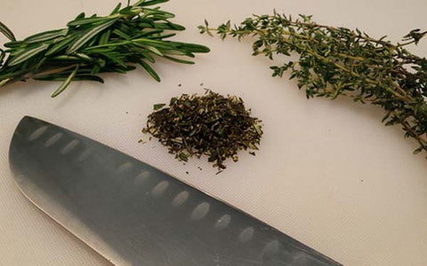 Image of Mince and combine the rosemary and thyme