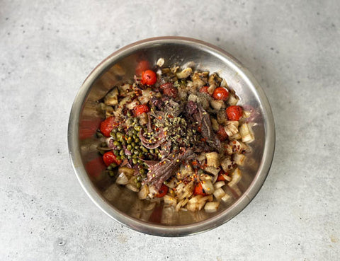 Image of grilled veggies in a mixing bowl