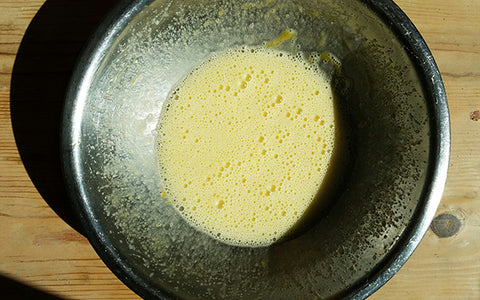 Image of In a large bowl, add eggs and granulated sugar. Set mixer on low speed, then gradually increase to high speed and beat until light pale yellow and thickened—about 1½ minutes. Reduce speed to medium and add cream and vanilla, beating 30 more seconds to blend. Add flour, baking powder and salt and mix till combined