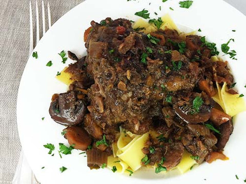 Image of Basque-Style Braised Lamb Shanks with Rosemary and Red Wine