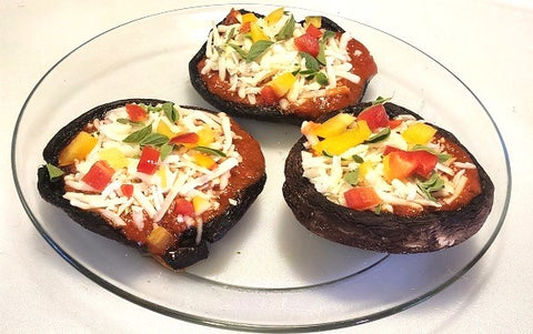 Image of mini portobello mushroom pizzas with veggies