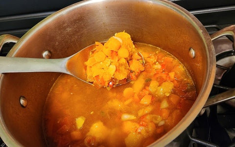 Image of simmering soup with roasted vegetables