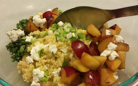 Image of mixing salad ingredients