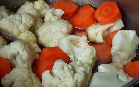Image of Steam carrots and cauliflower for 3 minutes.