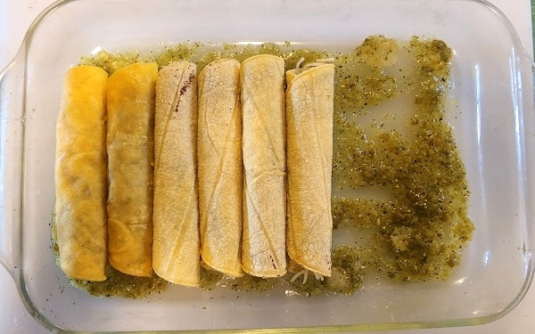 Image of enchiladas assembled in pan