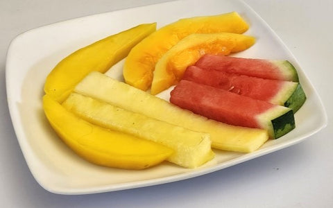 Image of sliced fruit arranged on plate