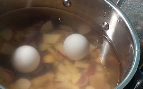 Image of boiling eggs and potatoes