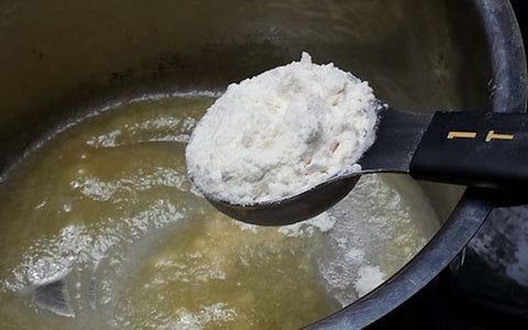 Image of Melt butter in a medium sauce pan over medium heat. Once bubbling, stir in flour slowly and cook 1 minute