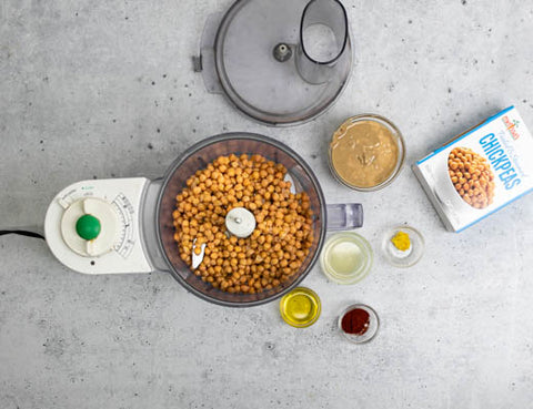 Image of hummus ingredients in food processor bowl