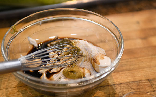 Image of balsamic dressing mixed